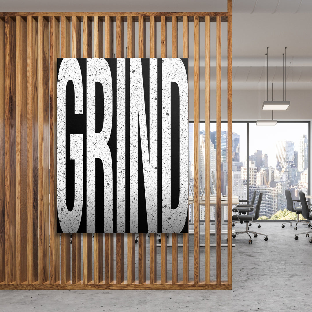 Motivační obraz Grind - Velká písmena na dřevěné stěně.