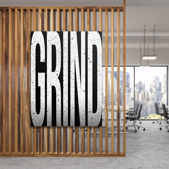 Motivační obraz Grind - Velká písmena na dřevěné stěně.