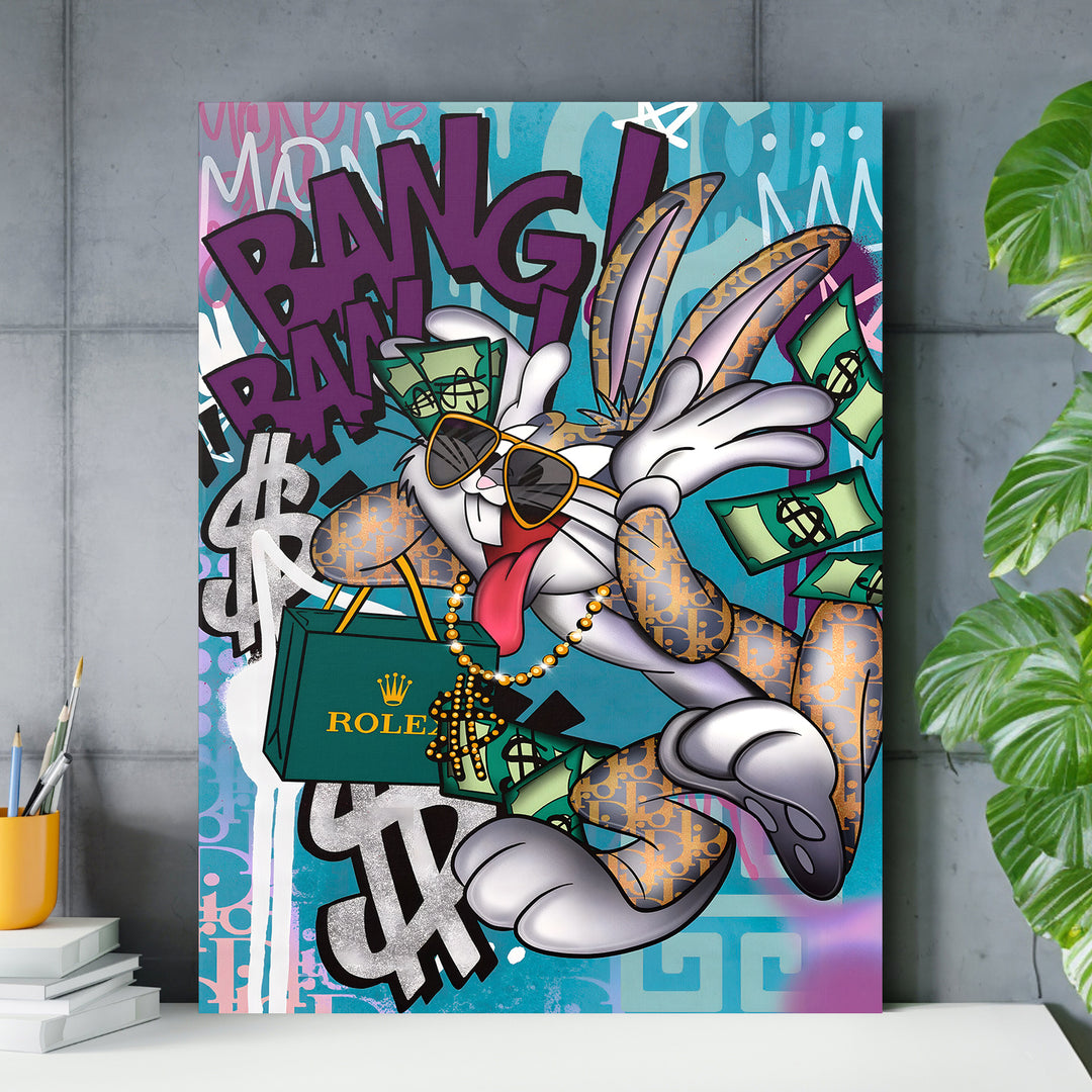 Motivační obraz Bugs Bunny Bang Bang nad pracovním stolem.