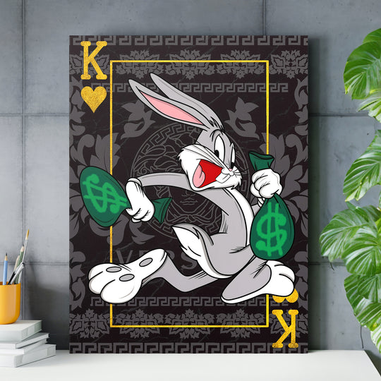 Motivační obraz Bugs Bunny nad pracovním stolem.
