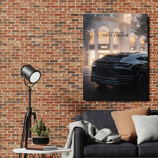 Motivační obraz na plátně s luxusním autem a citátem „It all starts with a dream“ v moderním interiéru