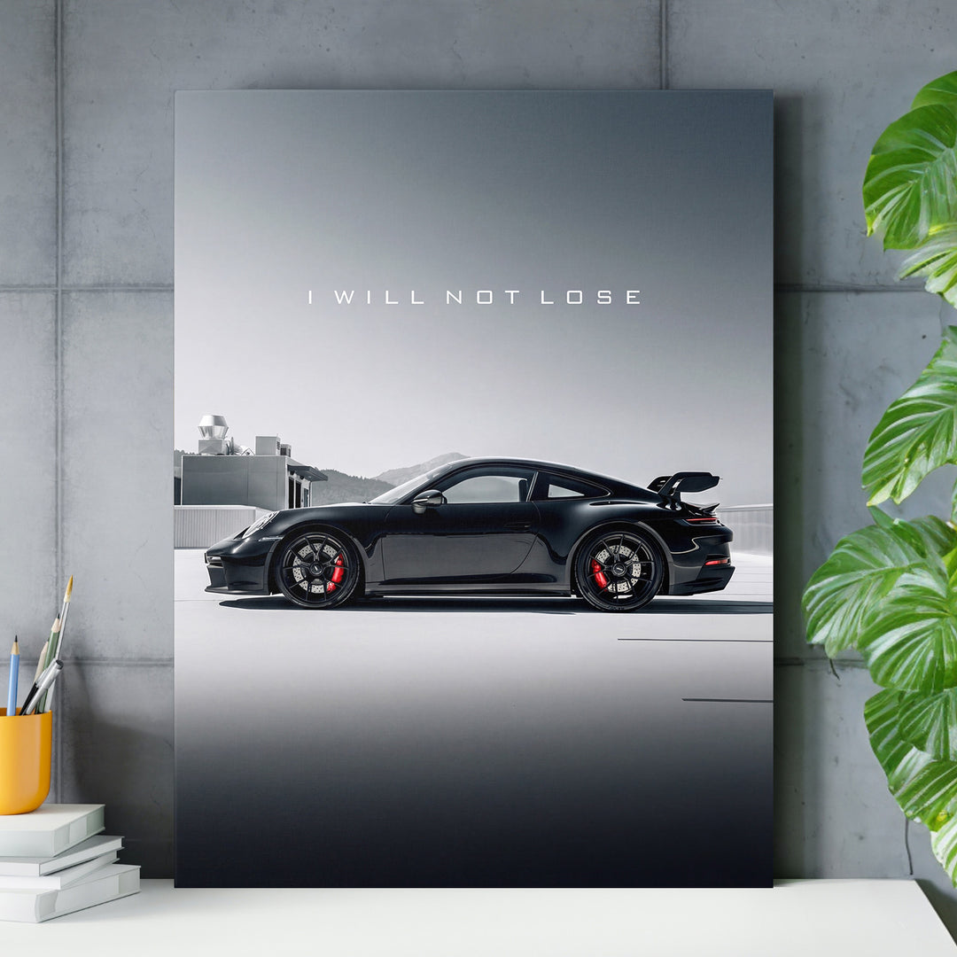 Motivační obraz na zeď s černým sportovním autem a citátem „I WILL NOT LOSE“ v moderní kanceláři