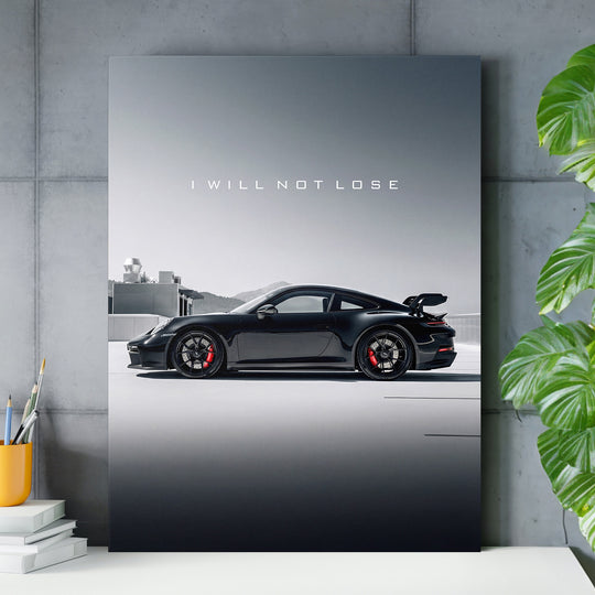 Motivační obraz na zeď s černým sportovním autem a citátem „I WILL NOT LOSE“ v moderní kanceláři