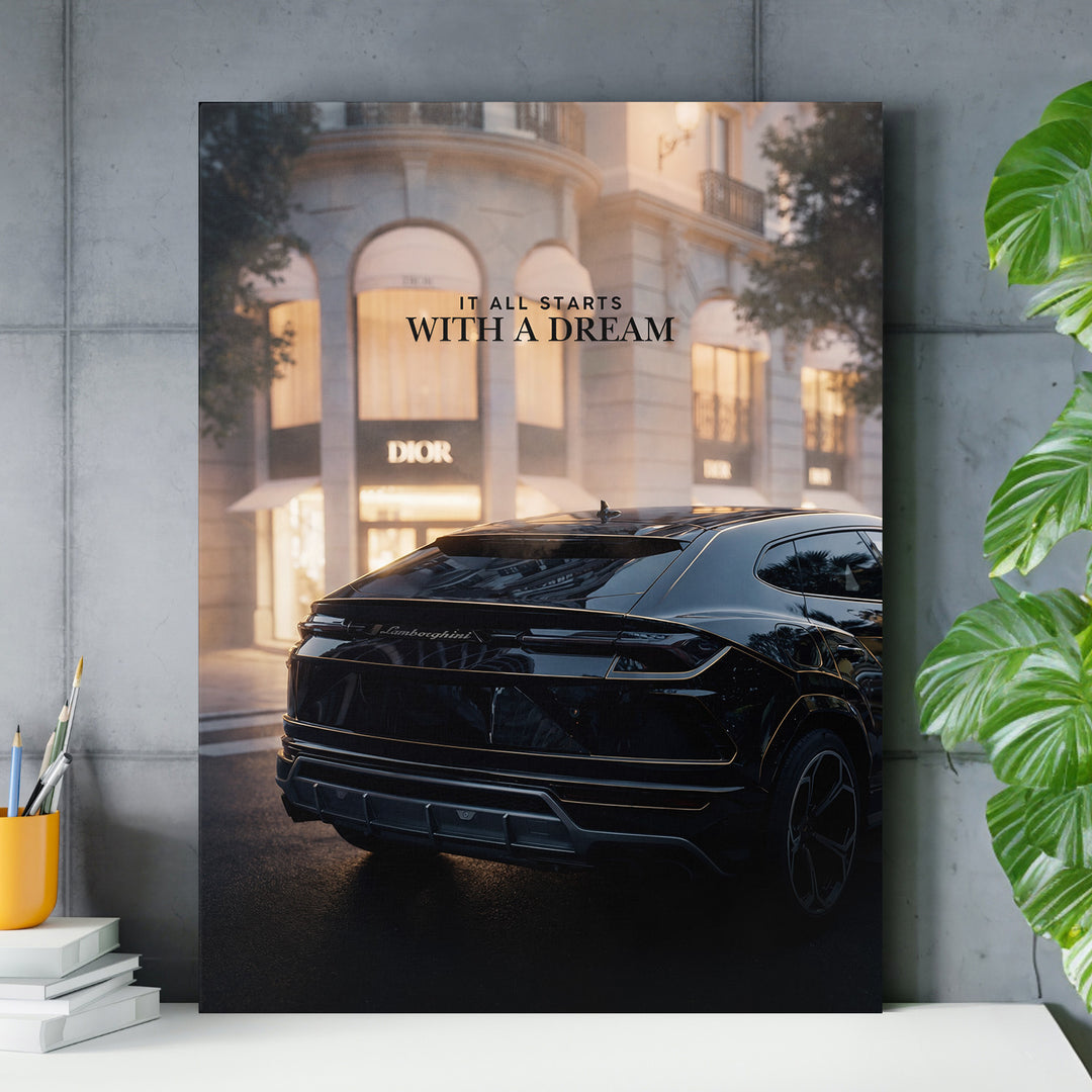 Luxusní obraz na zeď s černým Lamborghini před butikovým Dior a nápisem It all starts with a dream
