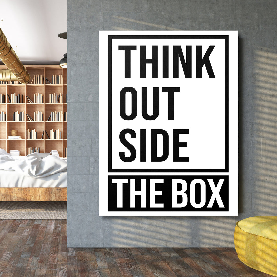 Motivační obraz na plátně Think Outside the Box v černobílém provedení nad postelí v moderní ložnici