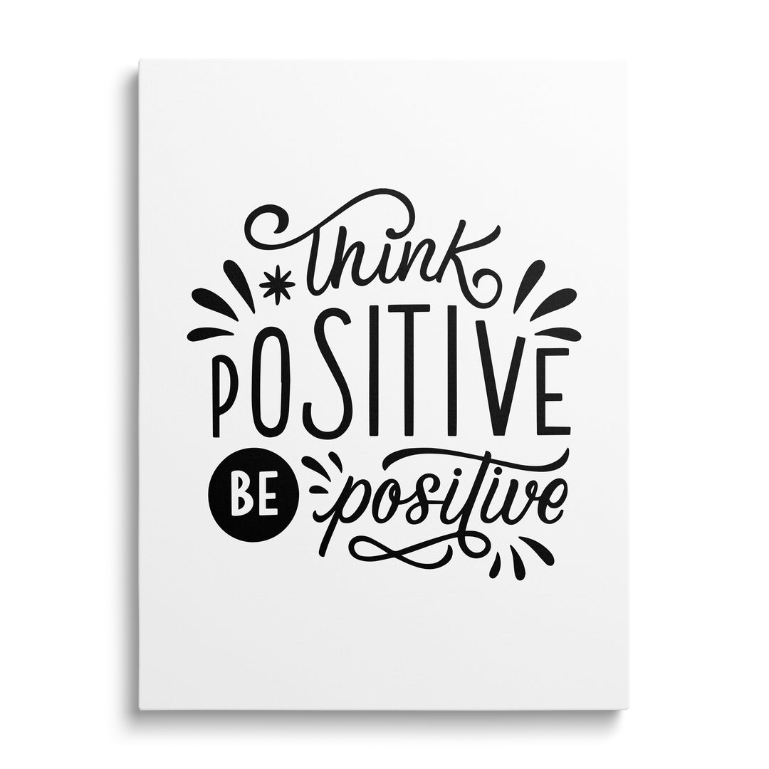 Motivační obraz na zeď s černobílým citátem „Think positive be positive“ v kaligrafii, pohled zepředu
