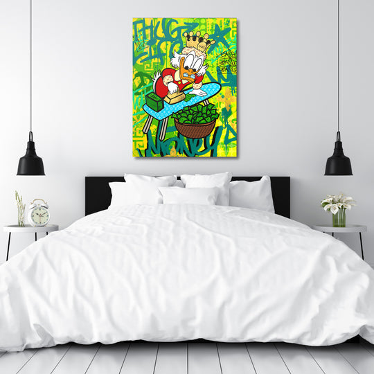 Motivační pop art obraz na plátně s Kačerem Skrblíkem a dolary zavěšený nad postelí v ložnici