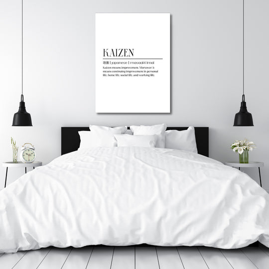 Motivační obraz na plátně s citátem Kaizen nad postelí v moderní minimalistické ložnici