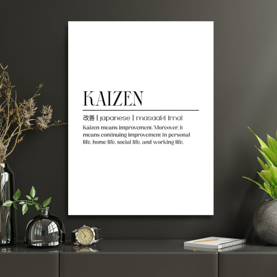 Motivační obraz na plátně KAIZEN s japonskými znaky v moderní minimalistické pracovně a zelenými rostlinami