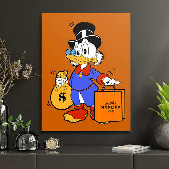 Motivační pop art obraz na plátně: kačer v pracovně drží pytel peněz a luxusní tašku Hermes