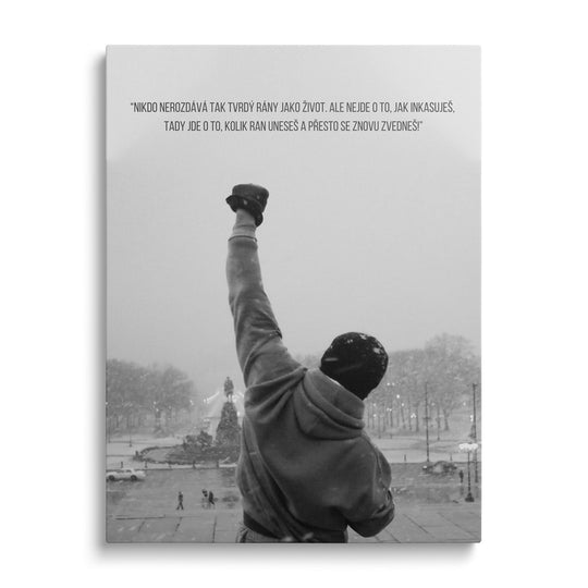 Motivační obraz Rocky se slavným citátem.