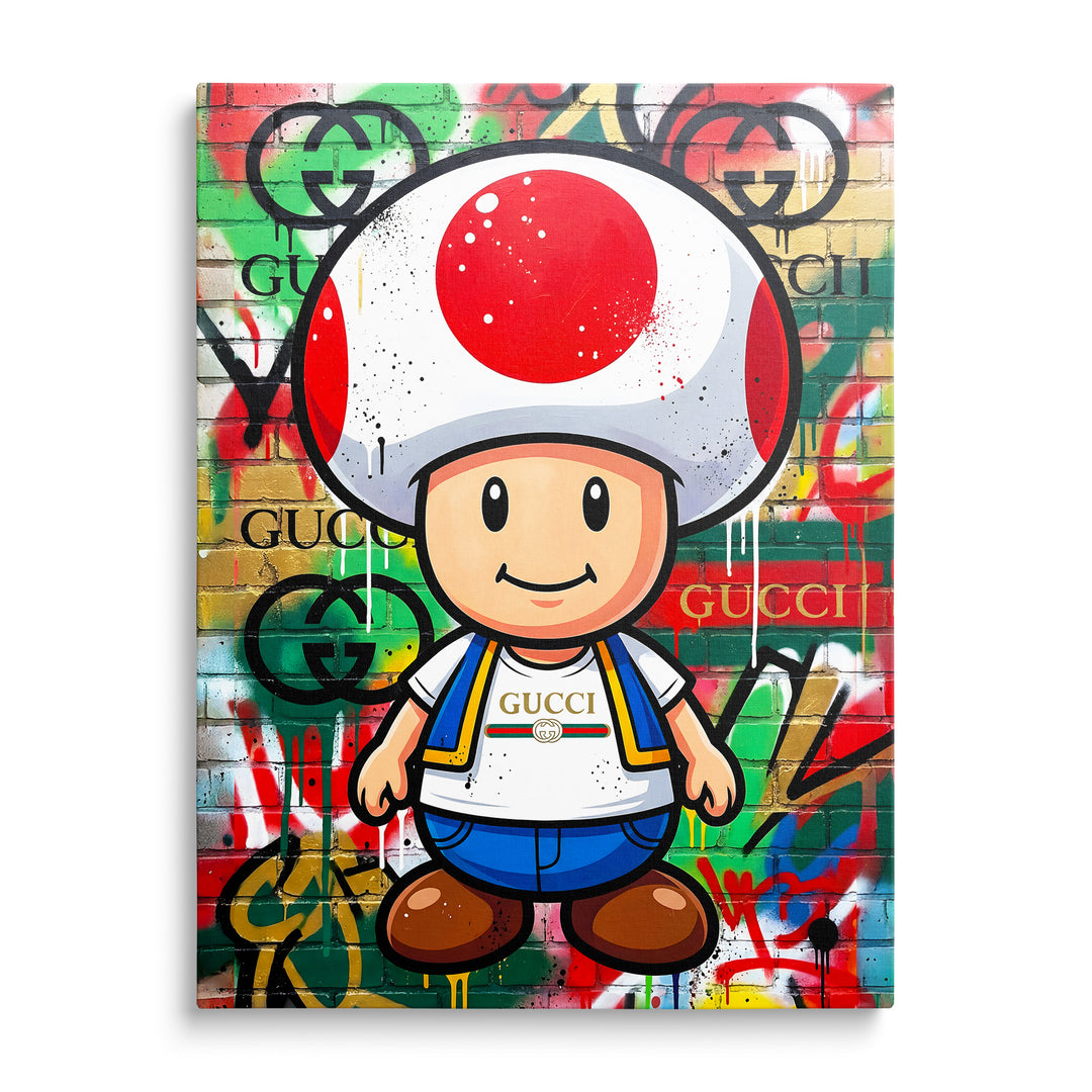 Toad s červenobílým kloboukem před barevnou graffiti zdí
