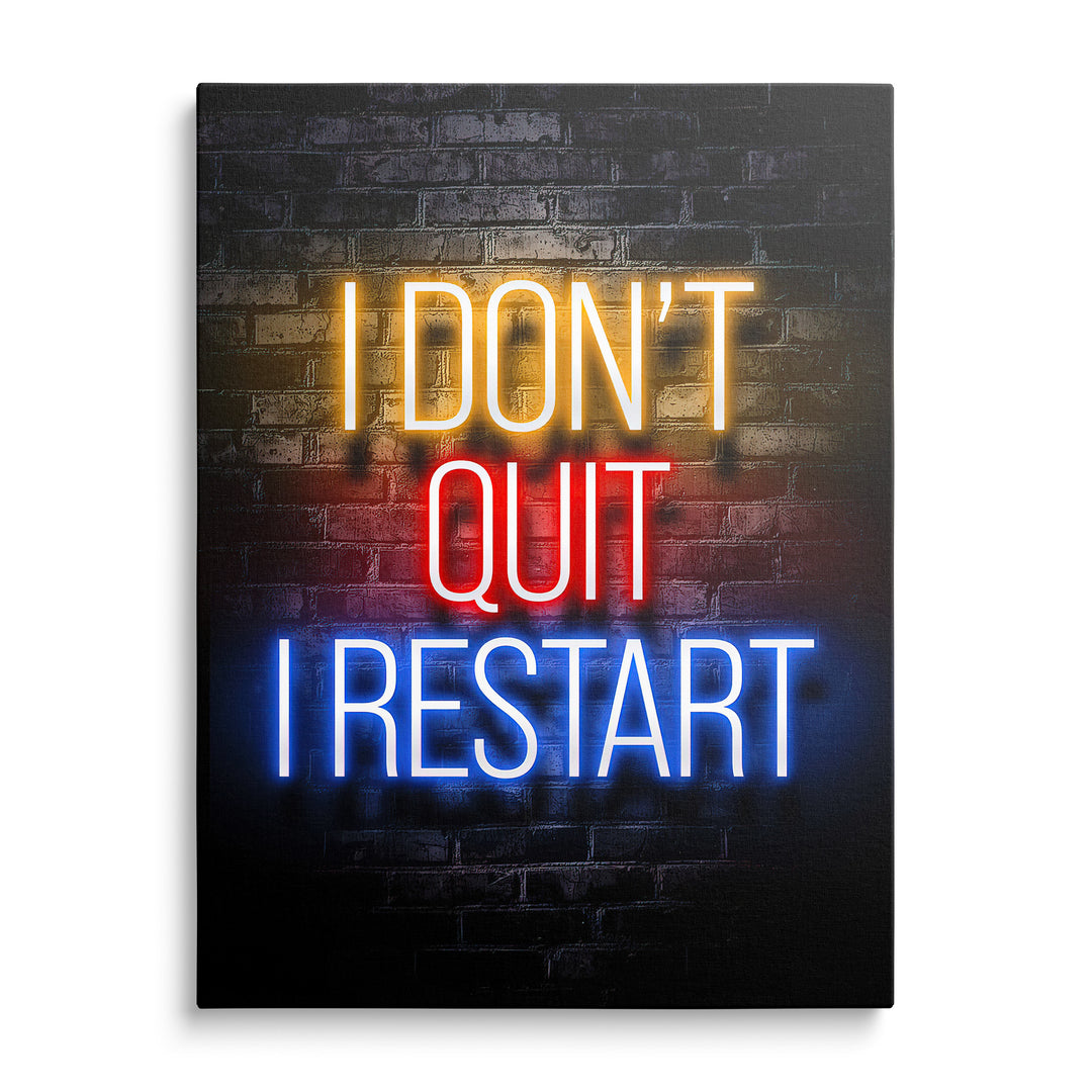 Žlutý, červený a modrý neonový nápis I Don't Quit I Restart