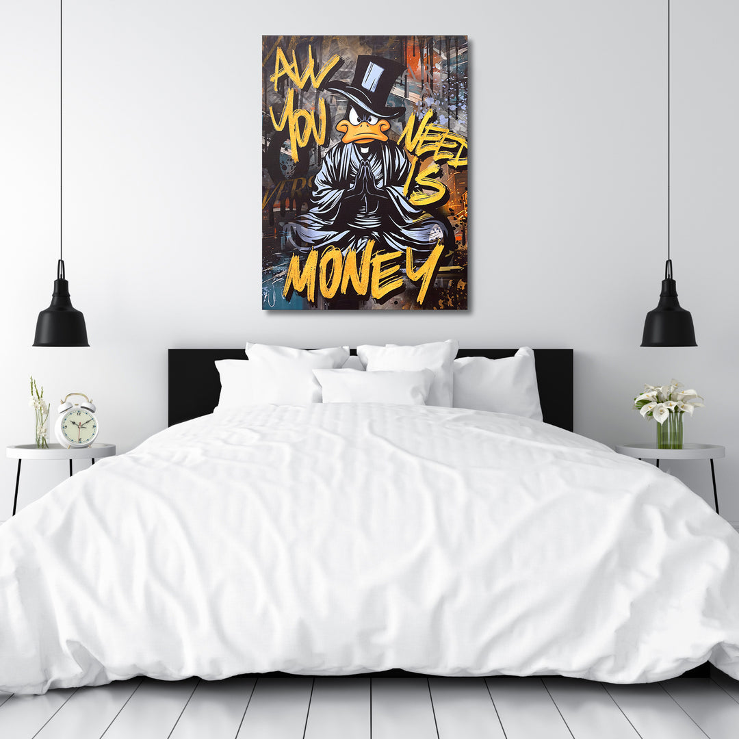 Motivační obraz černého kačera All You Need Is Money v ložnici.