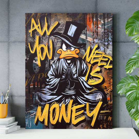 Motivační obraz černého kačera All You Need Is Money nad pracovním stolem.